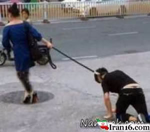 قلاده سگ , عکس عجیب و باورنکردنی , سوژه شبکه های اجتماعی , زن با قلاده شوهرش را می چرخاند